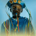 Estátua de cangaceiro com chapéu tradicional e fitas coloridas representando a cultura nordestina brasileira.