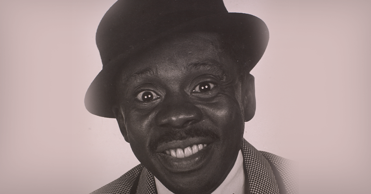 Imagem do ator Grande Otelo comemorando o Dia da Consciência Negra, símbolo da luta e cultura negra no Brasil.